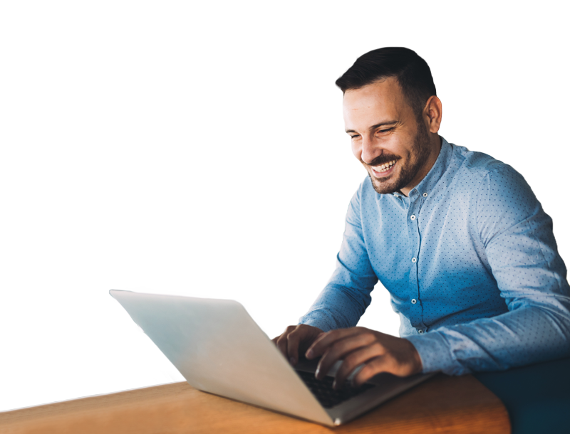 man-typing-on-laptop-smiling